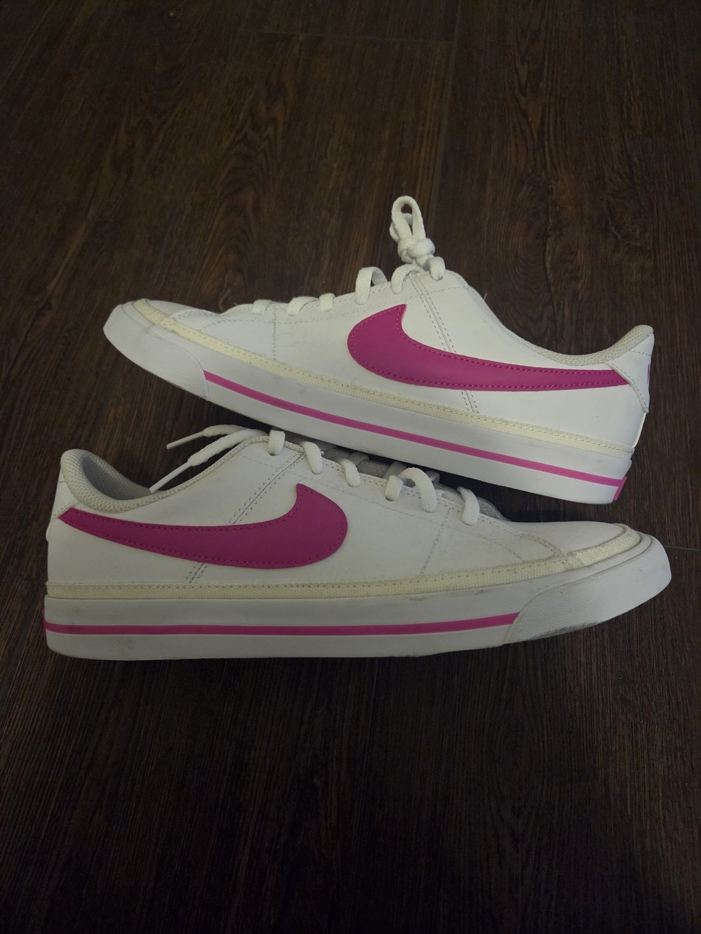 Nike Women’s Low-Top White Sneakers with Pink Swoosh